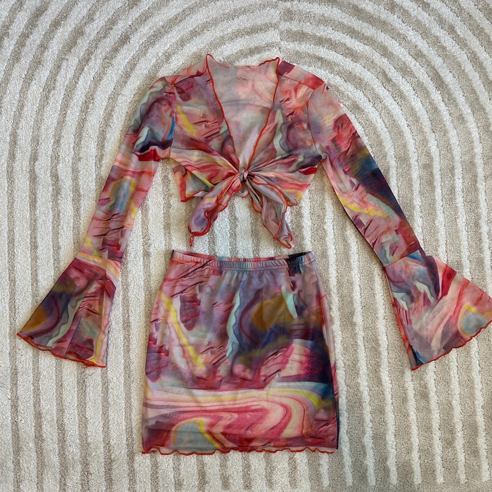 Pink colored marble print tie front co-ord set with mini skirt.